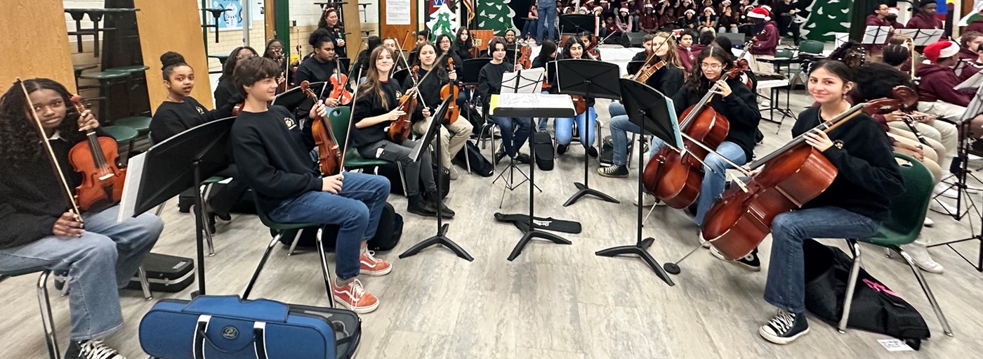 Orchestra students perform at a local elementary school for a winter concert 